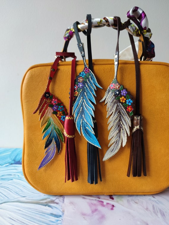 Feather bag best sale charm