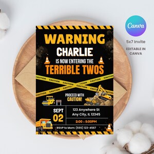 May include: A black and yellow invitation card with construction-themed graphics. The text reads "WARNING CHARLIE IS NOW ENTERING THE TERRIBLE TWOS." Includes event details and the Canva logo. The invitation is 5x7 inches.