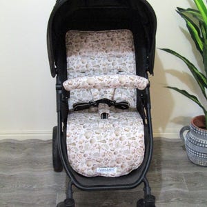 Forro de assento para carrinho de bebê - Conchas do mar - Fabricado na Austrália