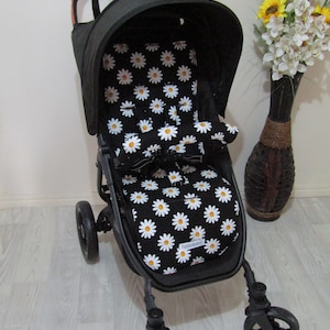Forro de assento para carrinho de bebê - Grande margarida retrô, preto - Fabricado na Austrália
