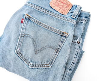 Pantalones vaqueros Levi's 505 vintage de mezclilla desgastada / 36x32