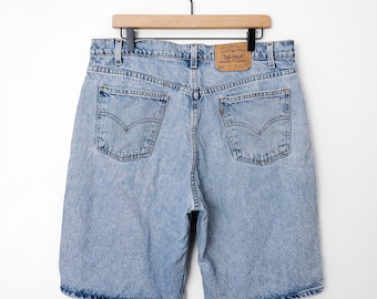 Pantalones cortos vaqueros Levi's 550 vintage de los 90 con etiqueta naranja / Talla 38W
