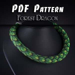 May include: PDF pattern for a beaded necklace called "Forest Dragon". The necklace is green and black and is displayed on a black mannequin.