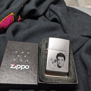 FREE SHIPPING-Vintage Matte/Satin Silver Tone Black Elvis Presley Bust with Guitar Zippo Lighter in Black Box.  See below for details