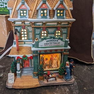 FREE SHIPPING- Painted Porcelain Illuminated Building. Lemax Carole Towne Collection. Donna's Dress Shop. - Etsy FREE SHIPPING- Painted Porcelain Illuminated Building. Lemax Carole Towne Collection. Donna's Dress Shop. - Etsy