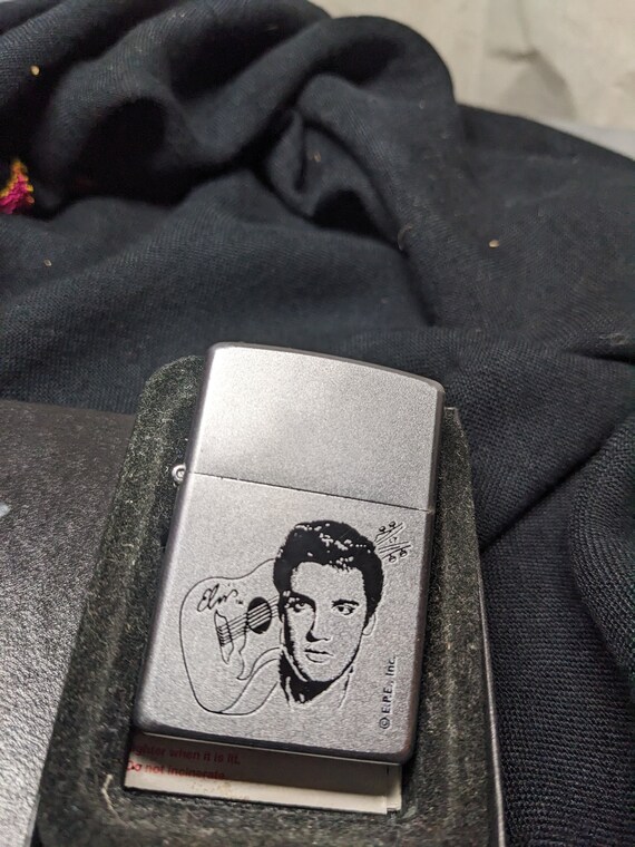 elvis presley cigarette lighter FREE Shipping-vintage Matte/satin Silver Tone Black Elvis Presley Bust With  Guitar Zippo Lighter in Black Box. See Below for Details
