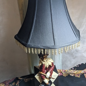 FREE SHIPPING- Vintage Desk Lamp- Red, White & Black Harlequin Jester Seated on Cube. Black Fabric Lamp Shade with Gold Tone Beaded Fringe.