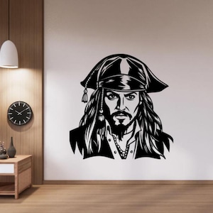 May include: Black and white wall decal of a pirate with long hair, a beard, and a tricorn hat. The pirate is wearing a collared shirt and a necklace. The image is a stylized illustration.