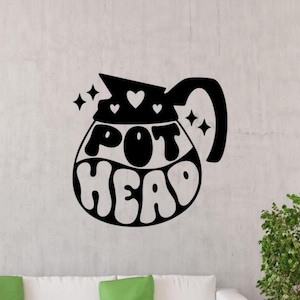 May include: Black and white wall decal of a coffee pot with the text "POT HEAD" in a retro font.