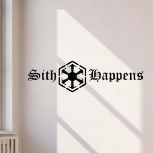 May include: Black wall decal featuring the phrase "Sith Happens" in a gothic font, with a stylized black emblem. The decal is affixed to a white wall, with a window and radiator visible in the background.