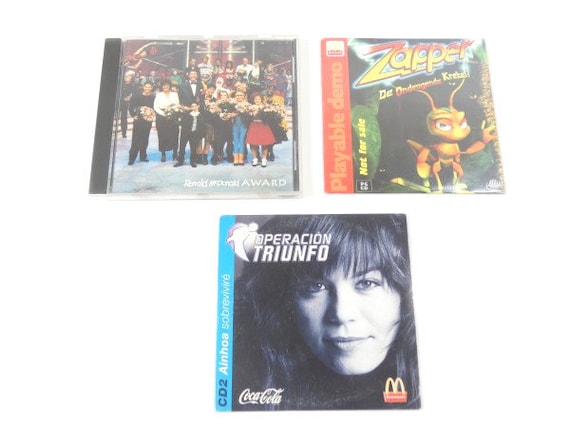 1 Vintage Mcdonald's Collectors CD Zapper Operacion Triunfo or