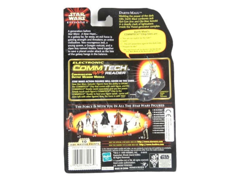 May include: Star Wars Episode I action figure of Darth Maul, a Sith Lord with a double-bladed lightsaber. The figure is packaged in a black and red box with a description of the character and the Star Wars logo. The back of the box shows other figures in the series and the Electronic CommTech Reader.