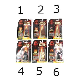 May include: Six Star Wars Episode I action figures in their original packaging. The figures are of Darth Maul, Qui-Gon Jinn, Obi-Wan Kenobi, Jar Jar Binks, Anakin Skywalker, and a Sith Trooper.