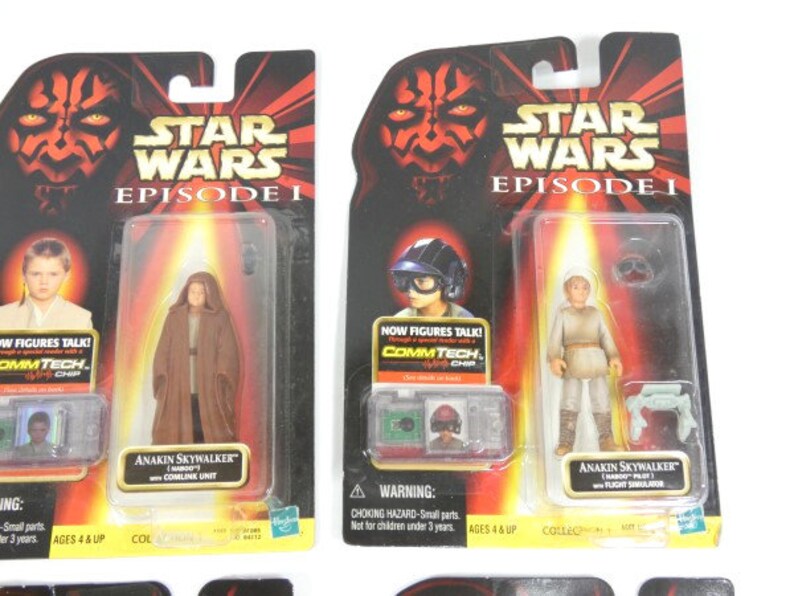 May include: Two Star Wars Episode I action figure packs. The figures are Anakin Skywalker and a Jedi Knight. The packaging features the Star Wars logo and the words "Now figures talk! CommTech Chip".