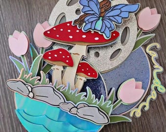 Adorno para tarta de hada sobre un hongo