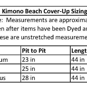 May include: A white chart titled "Kimono Beach Cover-Up Sizing" with measurements in inches. The chart lists sizes, pit-to-pit measurements, and lengths. Sizes include Small/Medium, One Size, and One Size - Plus.