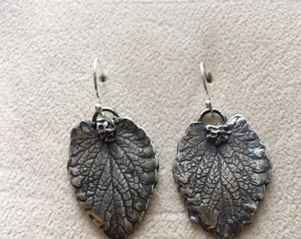 Sterling silver mint leaf dangle earrings.
