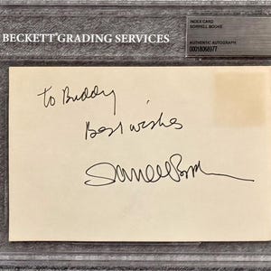 May include: A Beckett Grading Services graded index card with an authentic autograph by Sorrell Booke. The card is inscribed "to Buddy, best wishes" and signed. The card is encased in a clear protective holder.