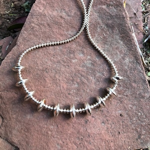 Handcrafted Sterling Silver  Navajo Pearl style saucer beads in 24” length