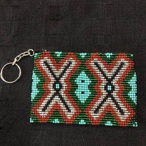 Handcrafted beadwork change purse with key ring made by an indigenous artisan in the highlands of Guatemala.