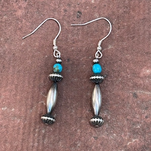 Handcrafted sterling silver Navajo Pearl style sterling silver earrings made in Tucson, AZ. USA