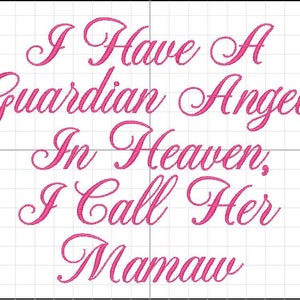 May include: Pink embroidered text on a white grid background reads: "I Have A Guardian Angel In Heaven, I Call Her Mamaw." The text is in a cursive font, suitable for a gift or memorial.