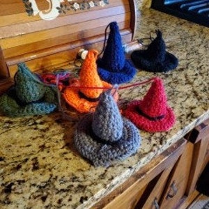 crocheted hanging witches hats