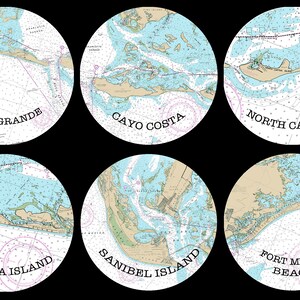 May include: Six round coasters with nautical maps of different Florida islands. The coasters feature the names "Boca Grande", "Cayo Costa", "North Captiva", "Captiva Island", "Sanibel Island", and "Fort Myers Beach".
