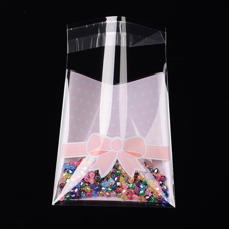 20 pochettes , sachets plastique avec bande adhésive dimension 12,5 x 8 cm , rose et blanc image 2