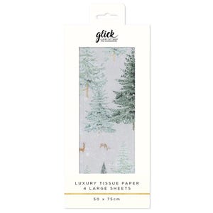 May include: White package of luxury tissue paper with a winter forest design. The tissue paper features illustrations of evergreen trees, deer, and falling snow. The package reads "glick LUXURY GIFT WRAP AND ACCESSORIES" and "4 LARGE SHEETS" with dimensions of 50 x 75 cm.