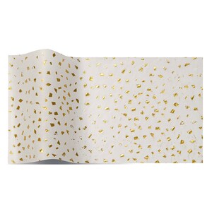 May include: White tissue paper with a gold confetti pattern.
