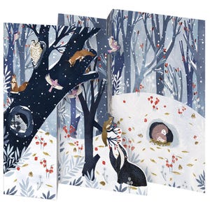 May include: A pop-up book for children with a winter forest scene. The illustrations show an owl, fox, raccoon, squirrel, and badger in a snowy forest with red berries. The colour scheme includes blues, whites, and browns, creating a whimsical atmosphere.