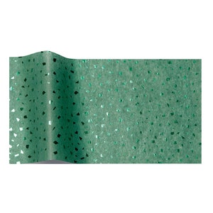 May include: Green tissue paper with a silver glitter pattern. The paper has a subtle texture and is ideal for wrapping gifts or adding a touch of sparkle to crafts.