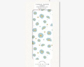 May include: White tissue paper with a pattern of blue daisies and gold hearts. The packaging reads "TISSUE PAPER 4 SHEETS SHEET SIZE 50cm x 75cm Designed in the UK" and features the Belly Button Designs logo.