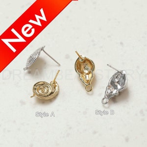 May include: Two styles of gold and silver seashell earring findings. Style A is a gold seashell with a spiral design. Style B is a silver seashell with a more rounded shape.