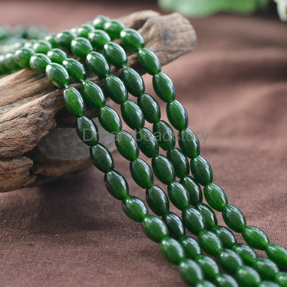 thumbnail image 2 of 6x9mm White Jade Gemstone Rice-Shaped Loose Beads – 15 Strands, Center-Drilled 2 of 4