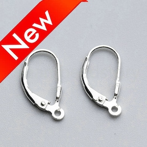 May include: Two silver earring hooks, also known as ear wires, are shown against a white background. The hooks are open and ready to be attached to earrings.