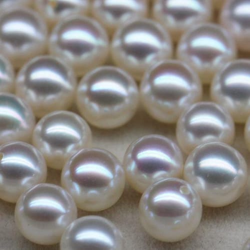 Perline rotonde in Diaspro Mookaite naturale 6 mm, lucidate
