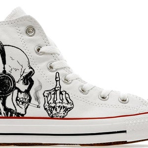 Skeleton wearing headphones up yours custom hightop converse