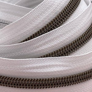 White Zipper Tape with Antique Bronze Nylon Coil (Size #5) - Zipper by the Yard