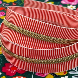 Striped Zipper Tape |  Size #5 | Red and White with Gold Nylon Coils | Zebra Zipper Tape