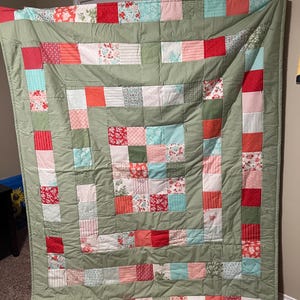 Red and green squares quilt