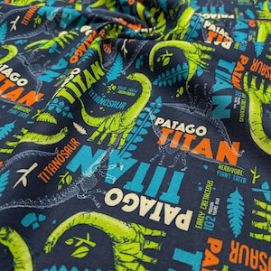 Dinosaur Cotton Fabric by the meter - Quilting, Sewing, Dressmaking, Tailoring, Doll Making, Kids Crafts, Beginner Friendly