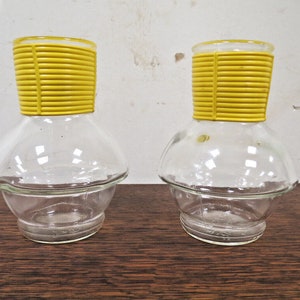 2 Vintage Mckee Hottle Glasbake Clear Glass Bottles With Yellow