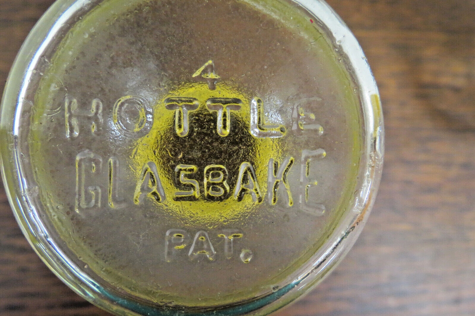 2 Vintage Mckee Hottle Glasbake Clear Glass Bottles With Yellow