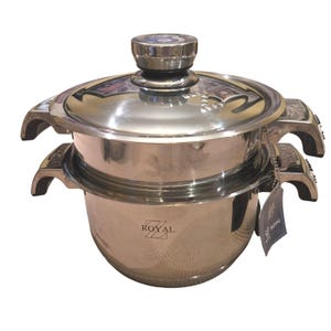 May include: A stainless steel cooking pot with a matching lid and two side handles. The pot features a polished finish and the word ROYAL printed on the front. A small tag with the same brand name is attached to one of the handles by a metal chain.