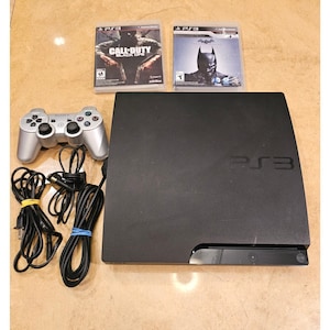 Consola Sony PlayStation 3 PS3 Slim de 160 GB CECH-3001A con 2 juegos y mando
