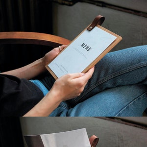 Menu clipboard for restaurant tables, the printed sheet held flat under a Chicago bolt