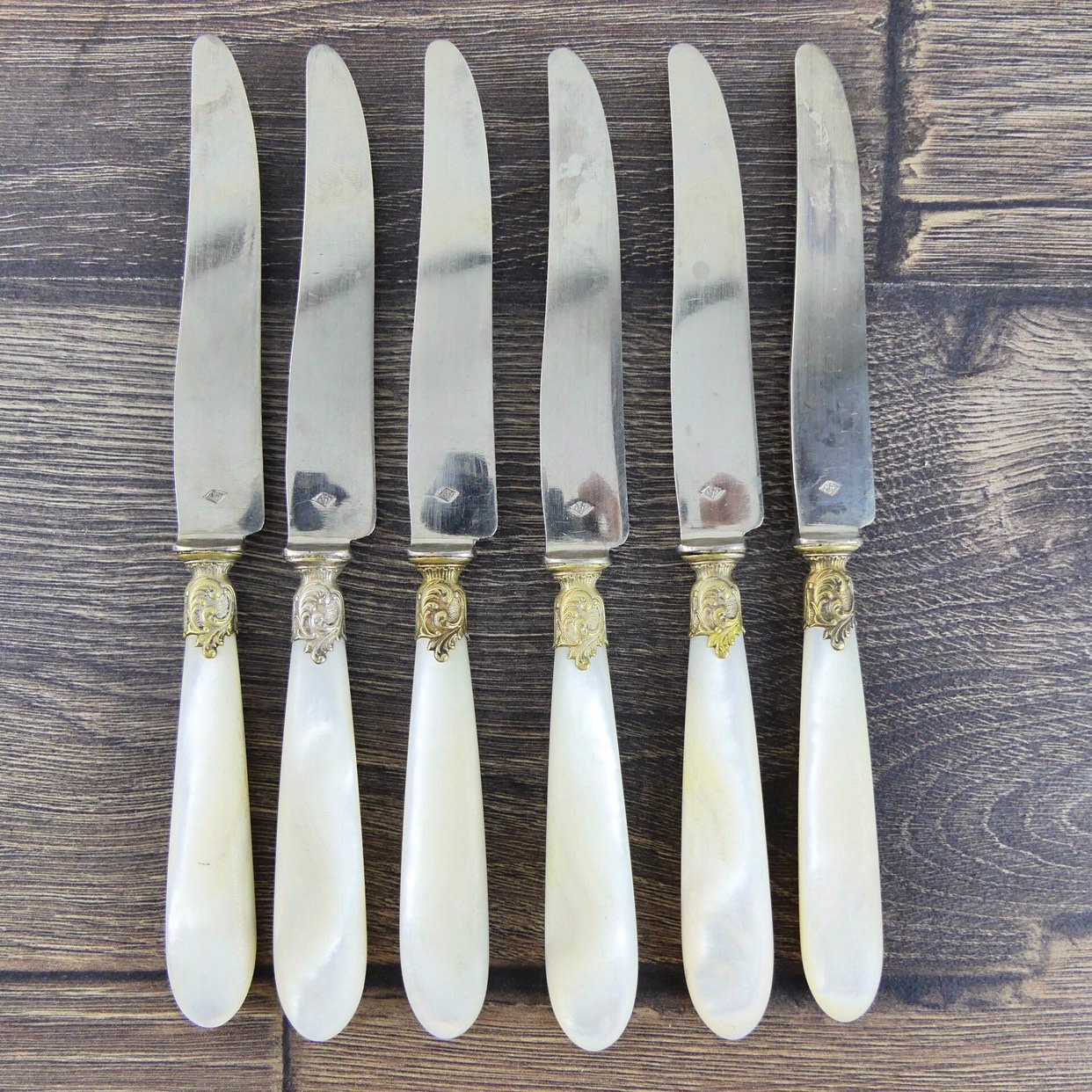 Pearl dessert cutlery, 6 dessert knives and 6 dessert forks
