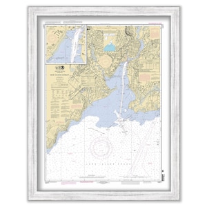 May include: A nautical chart of New Haven Harbor, Connecticut, showing the coastline, waterways, and surrounding land features. The chart includes depth soundings, navigational aids, and other important information for mariners.